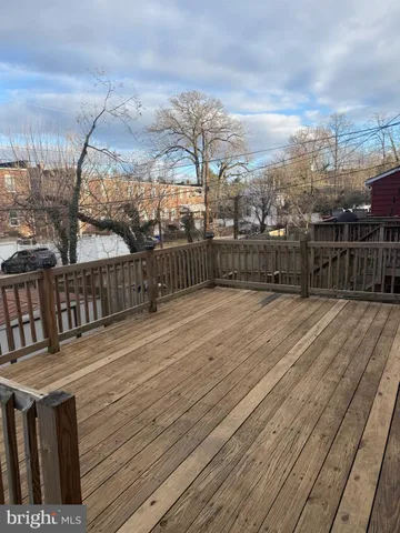 a terrace with wooden floor