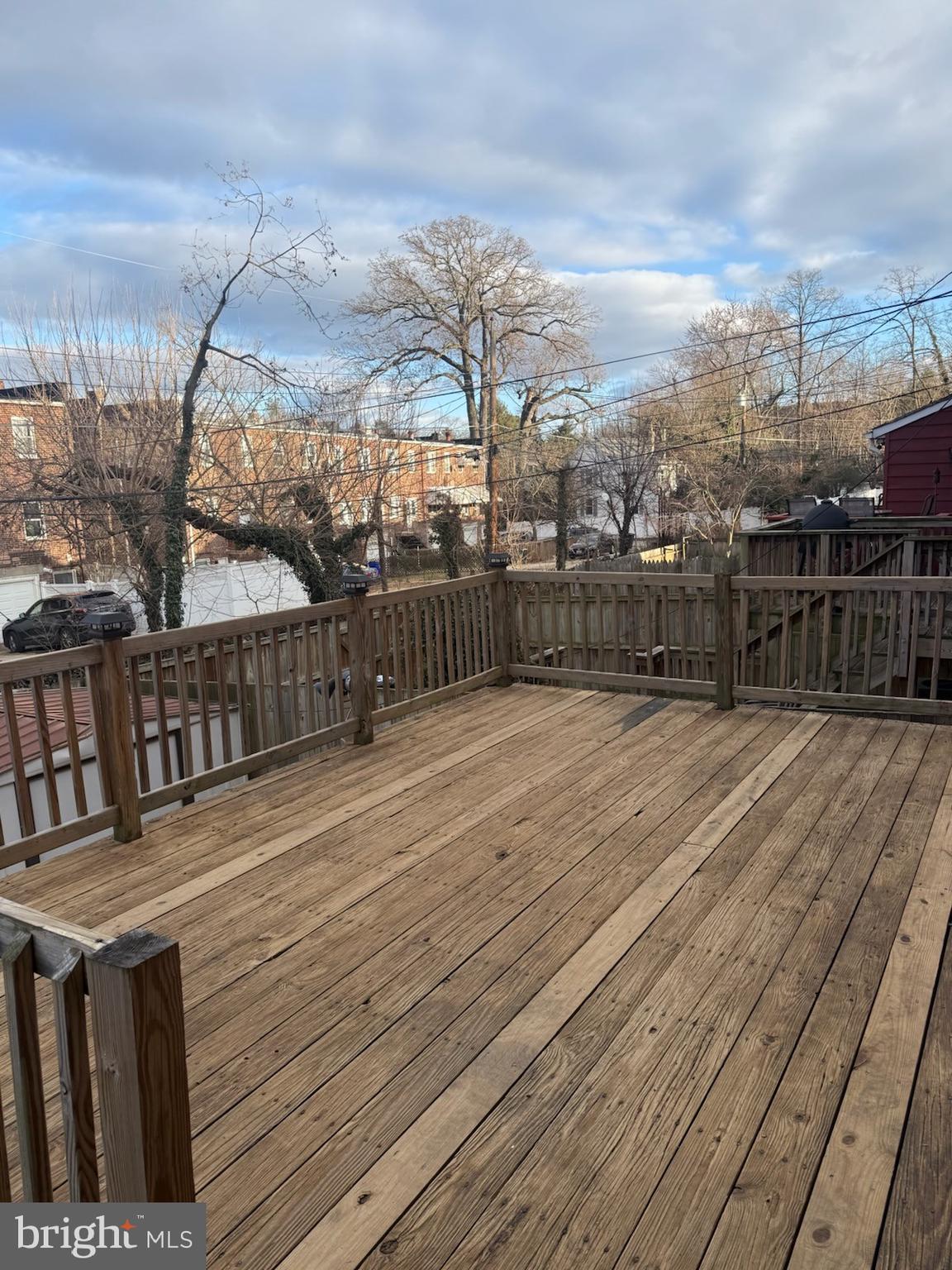 49 Briarwood Road Baltimore, MD 21228 - Photo 8 of 9 a terrace with wooden floor