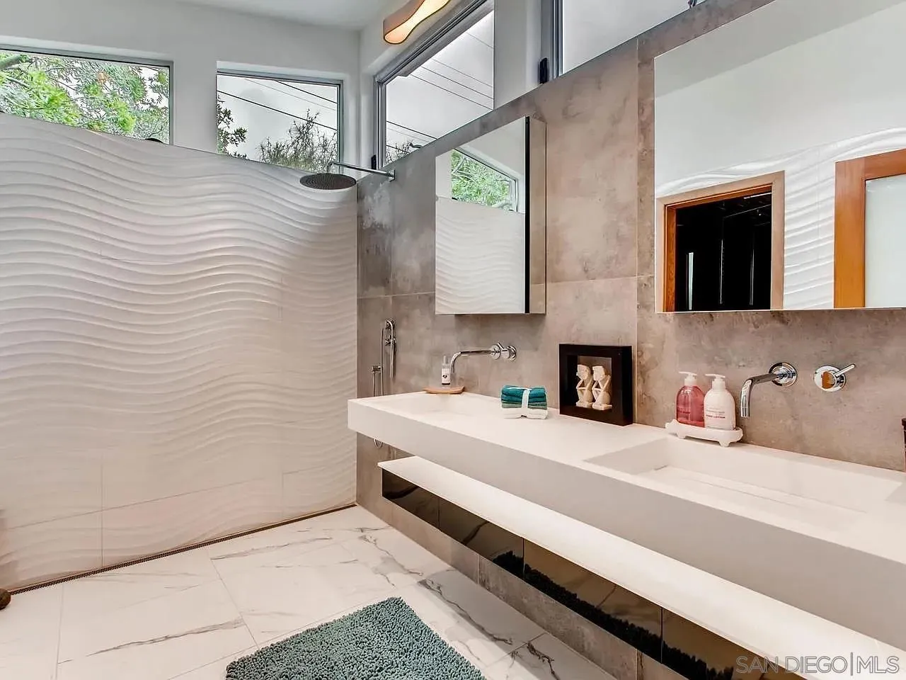 6428 Shirehall Drive San Diego, CA 92111 - Photo 9 of 15 a spacious bathroom with a sink and a mirror