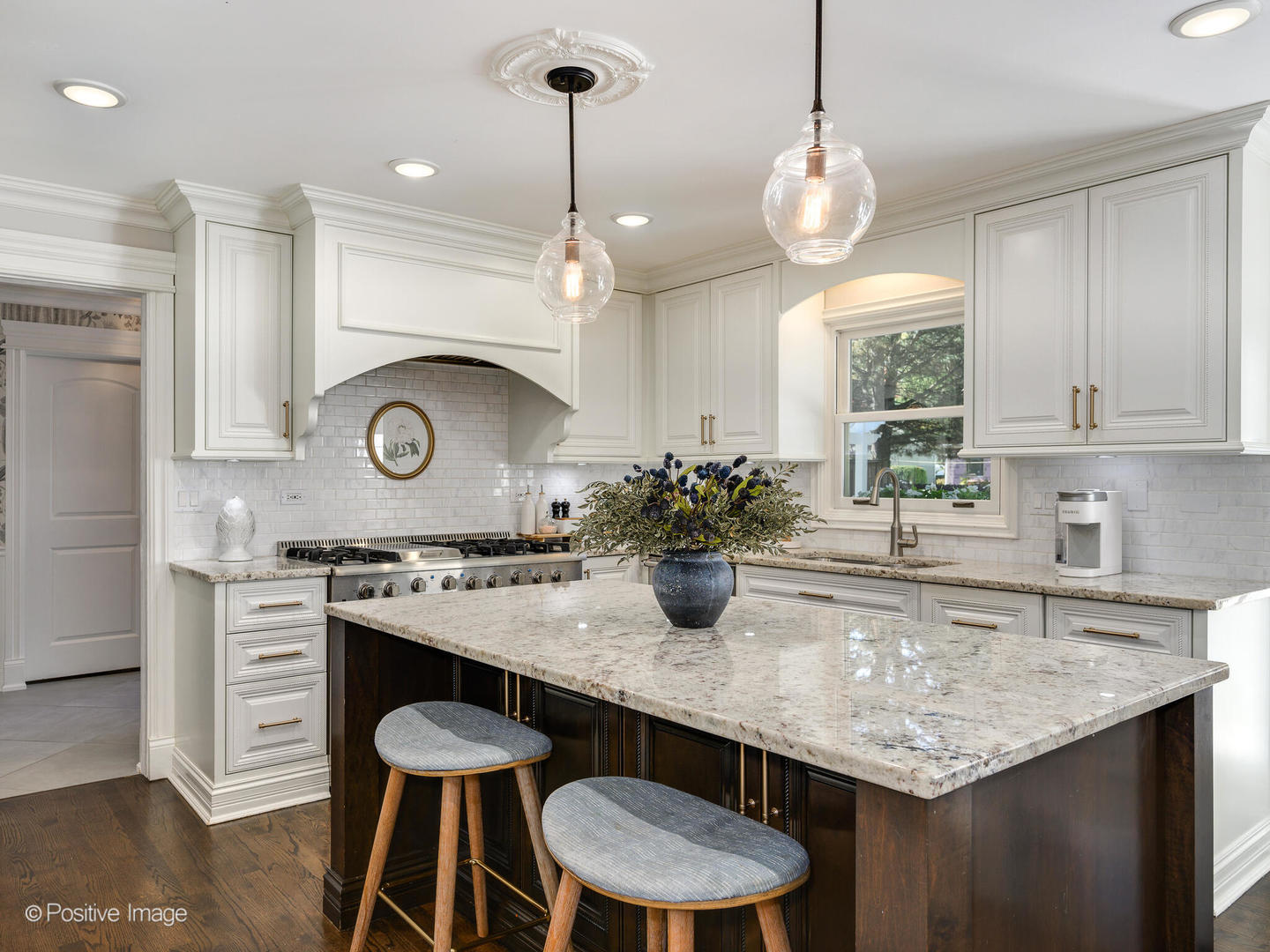 1026 Elmdale Road Glenview, IL 60025 - Photo 14 of 38 a kitchen with a table and chairs in it