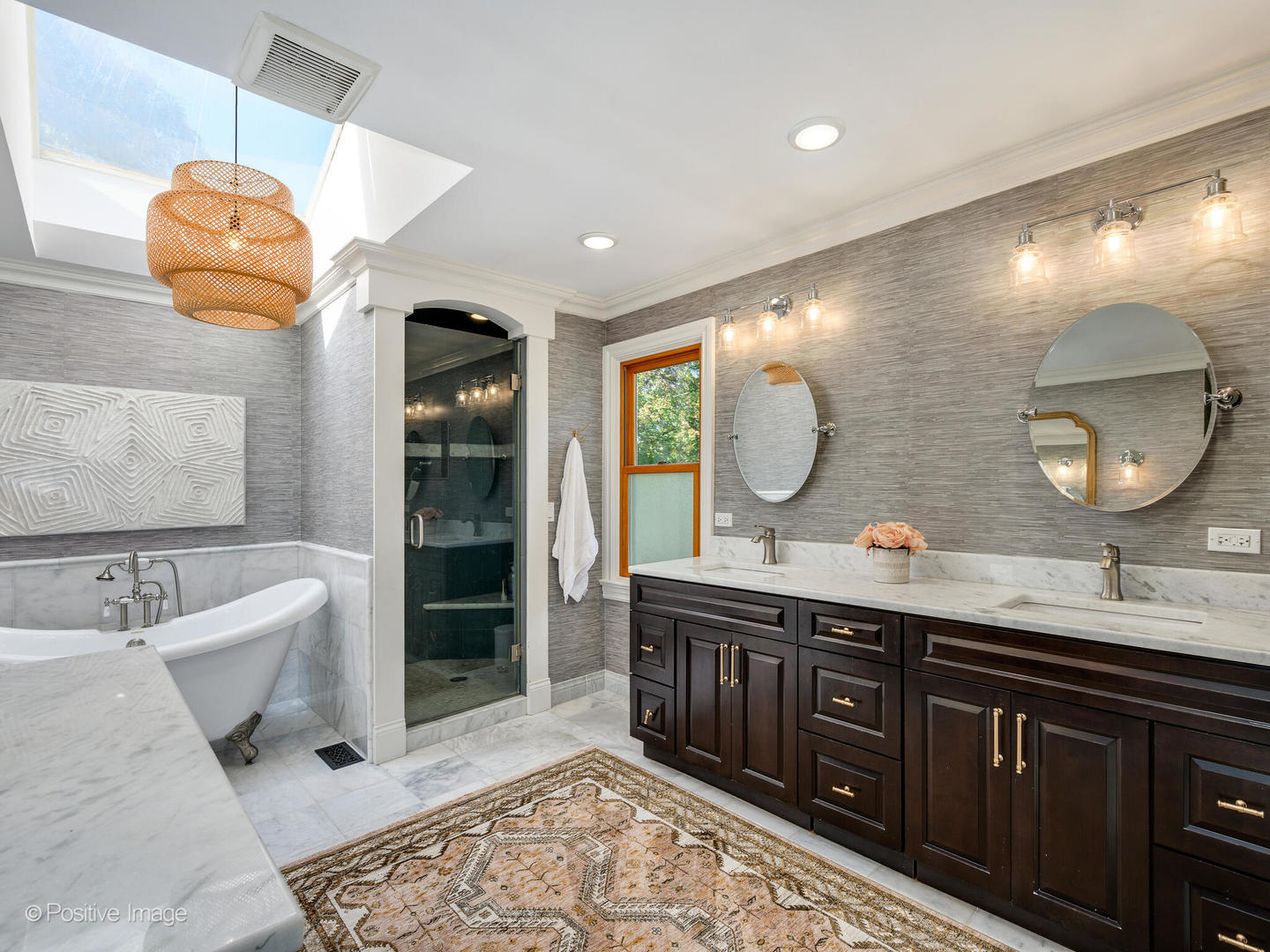 1026 Elmdale Road Glenview, IL 60025 - Photo 19 of 38 a bathroom with a sink double vanity and a mirror