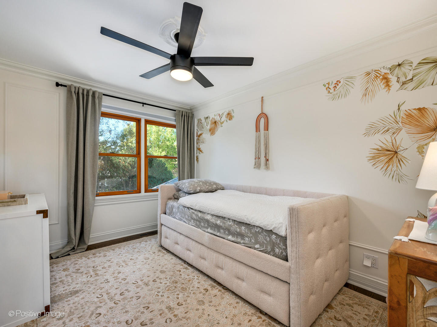 1026 Elmdale Road Glenview, IL 60025 - Photo 23 of 38 a bedroom with a large bed and a window