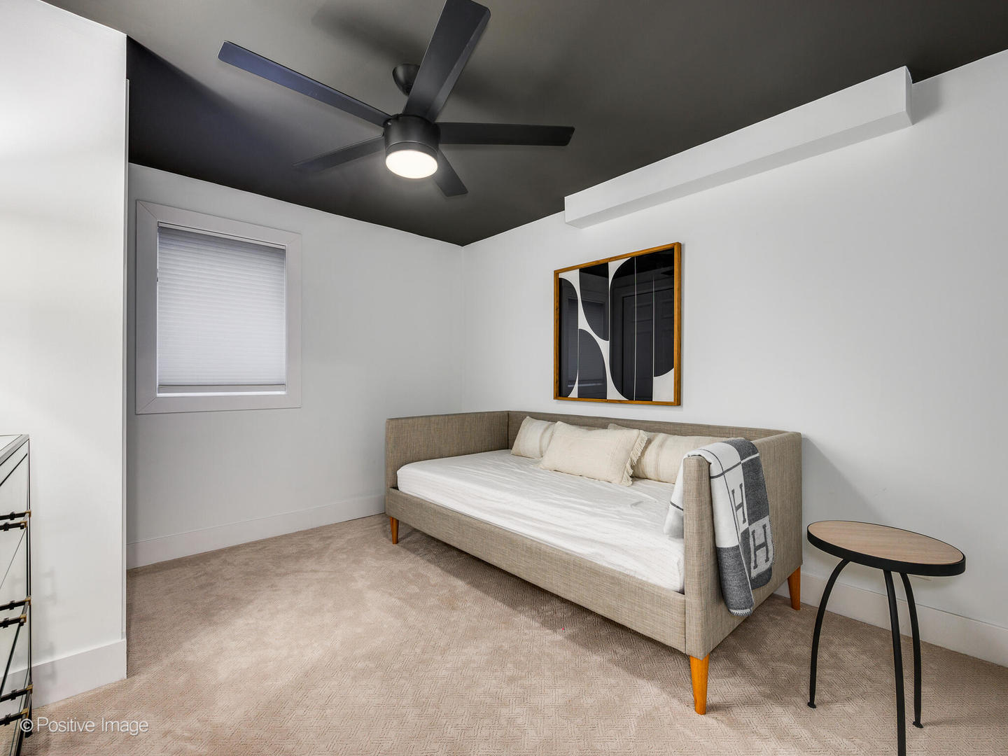 1026 Elmdale Road Glenview, IL 60025 - Photo 28 of 38 a spacious bedroom with a bed and a chandelier