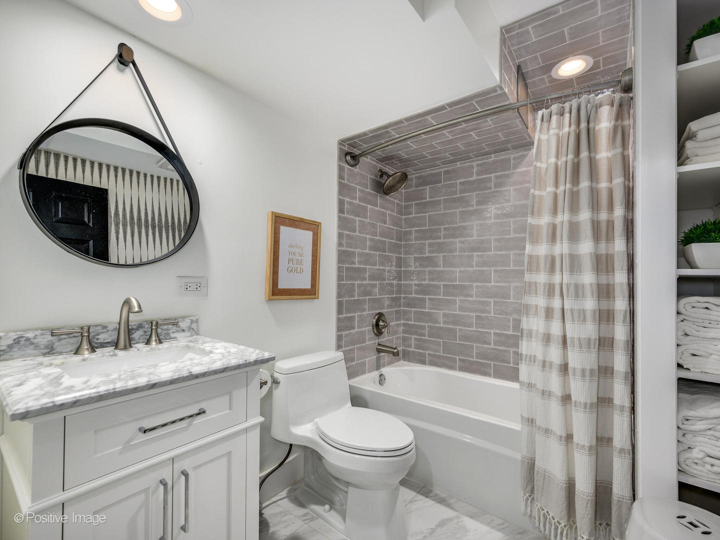1026 Elmdale Road Glenview, IL 60025 - Photo 29 of 38 a bathroom with a sink a toilet and shower