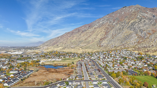 368 East 700 North Springville, UT 84663 - Photo 32 of 55 Aerial view of residential area featuring a water and mountain view