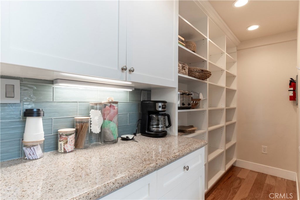 62 62nd Place Long Beach, CA 90803 - Photo 19 of 55 a kitchen with a refrigerator and sink