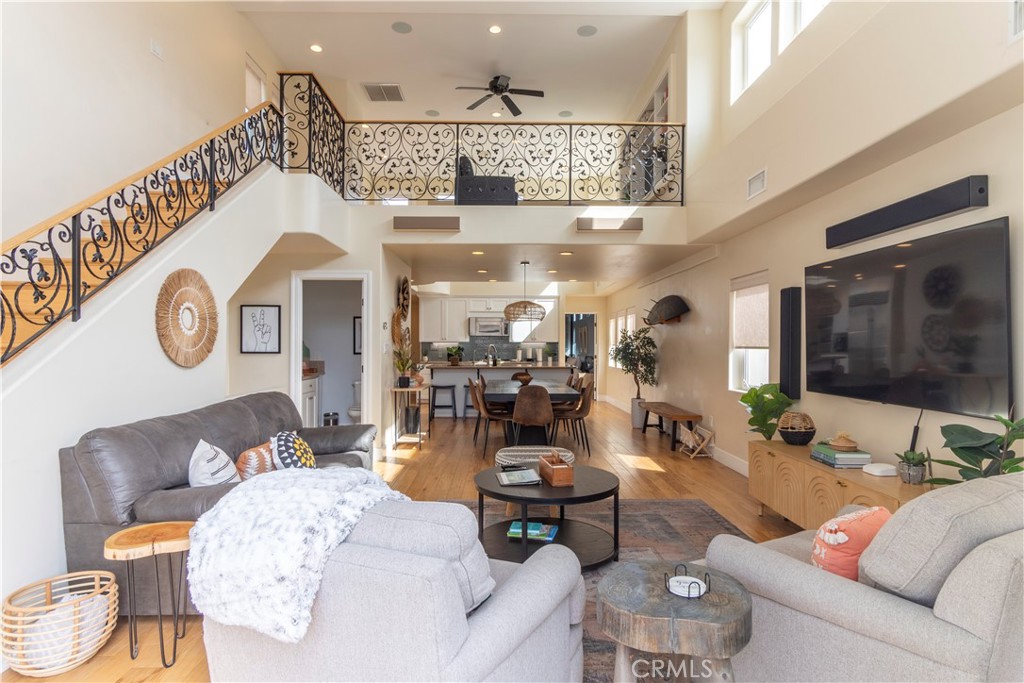62 62nd Place Long Beach, CA 90803 - Photo 27 of 55 a living room with furniture and a chandelier