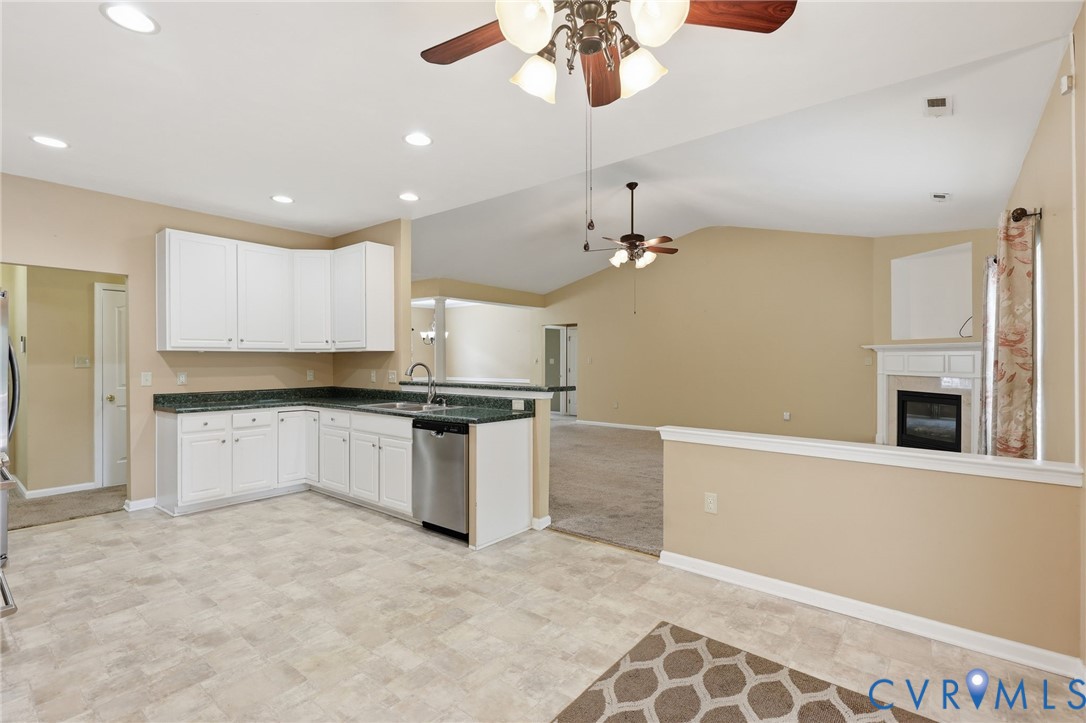 14719 Clover Ridge Lane Chesterfield, VA 23832 - Photo 11 of 36 Open-concept kitchen featuring white cabinetry, da