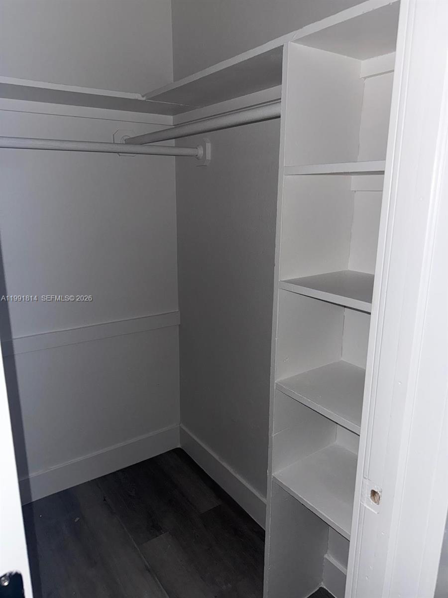 225 Southwest 76th Court, Unit 225 Miami, FL 33144 - Photo 7 of 7 a empty closet with white paint