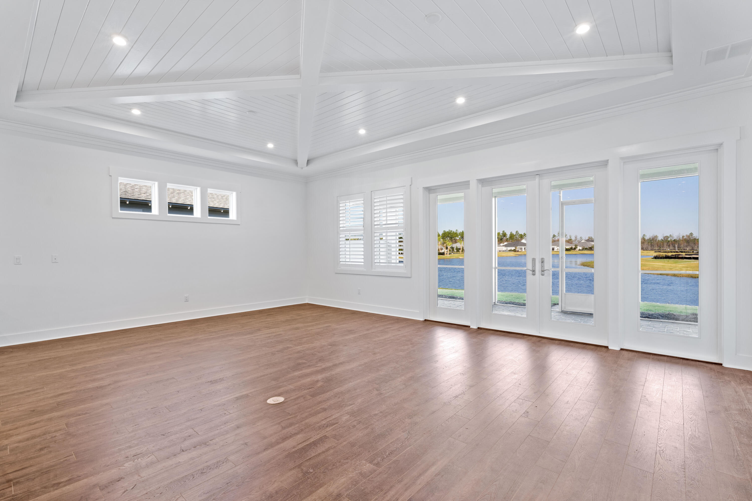 95 Ravine Rd Inlet Beach Inlet Beach, FL 32461 - Photo 18 of 42 a view of an empty room with window and wooden floor