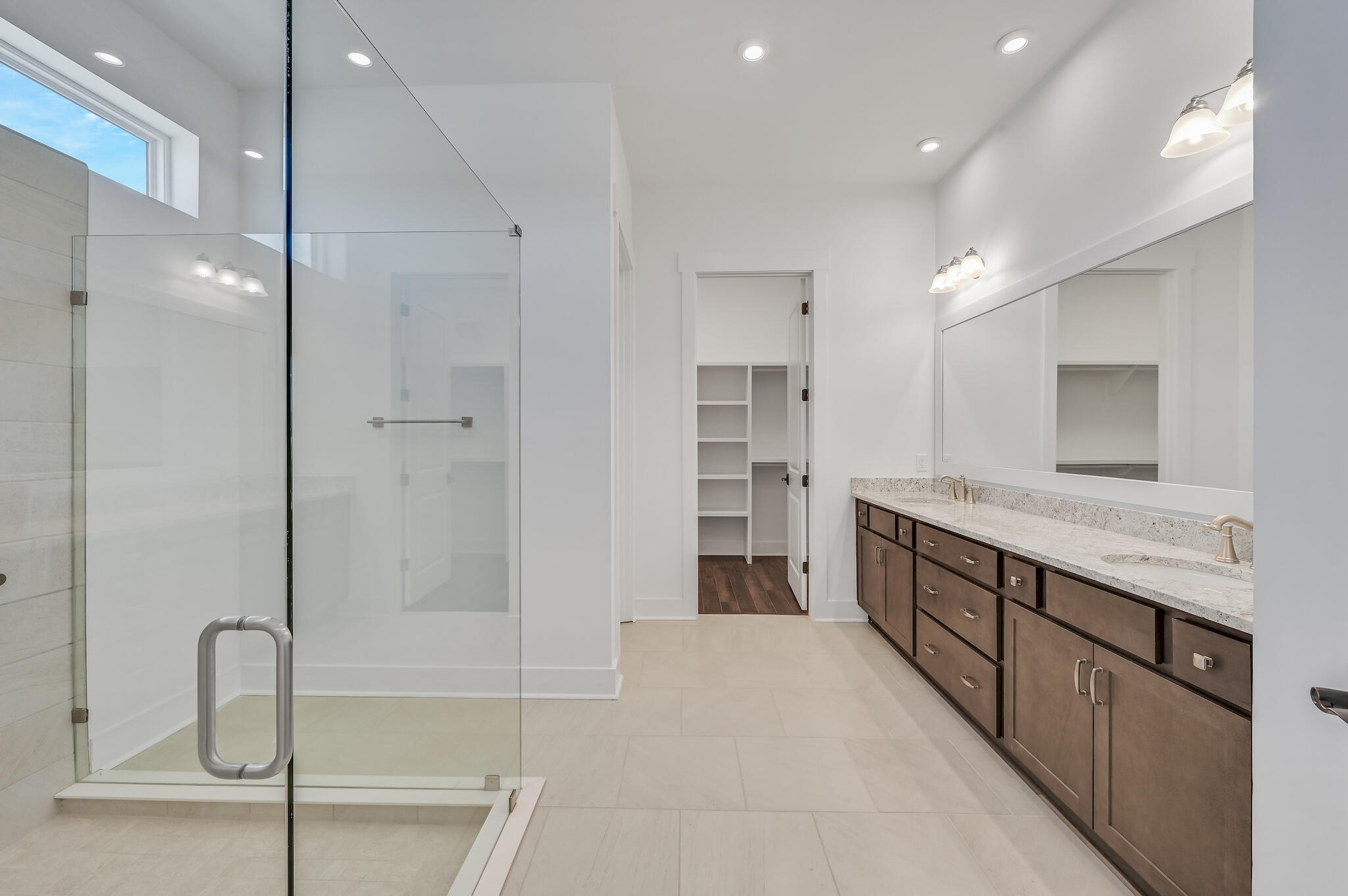 95 Ravine Rd Inlet Beach Inlet Beach, FL 32461 - Photo 28 of 42 a large bathroom with a double vanity sink and a mirror