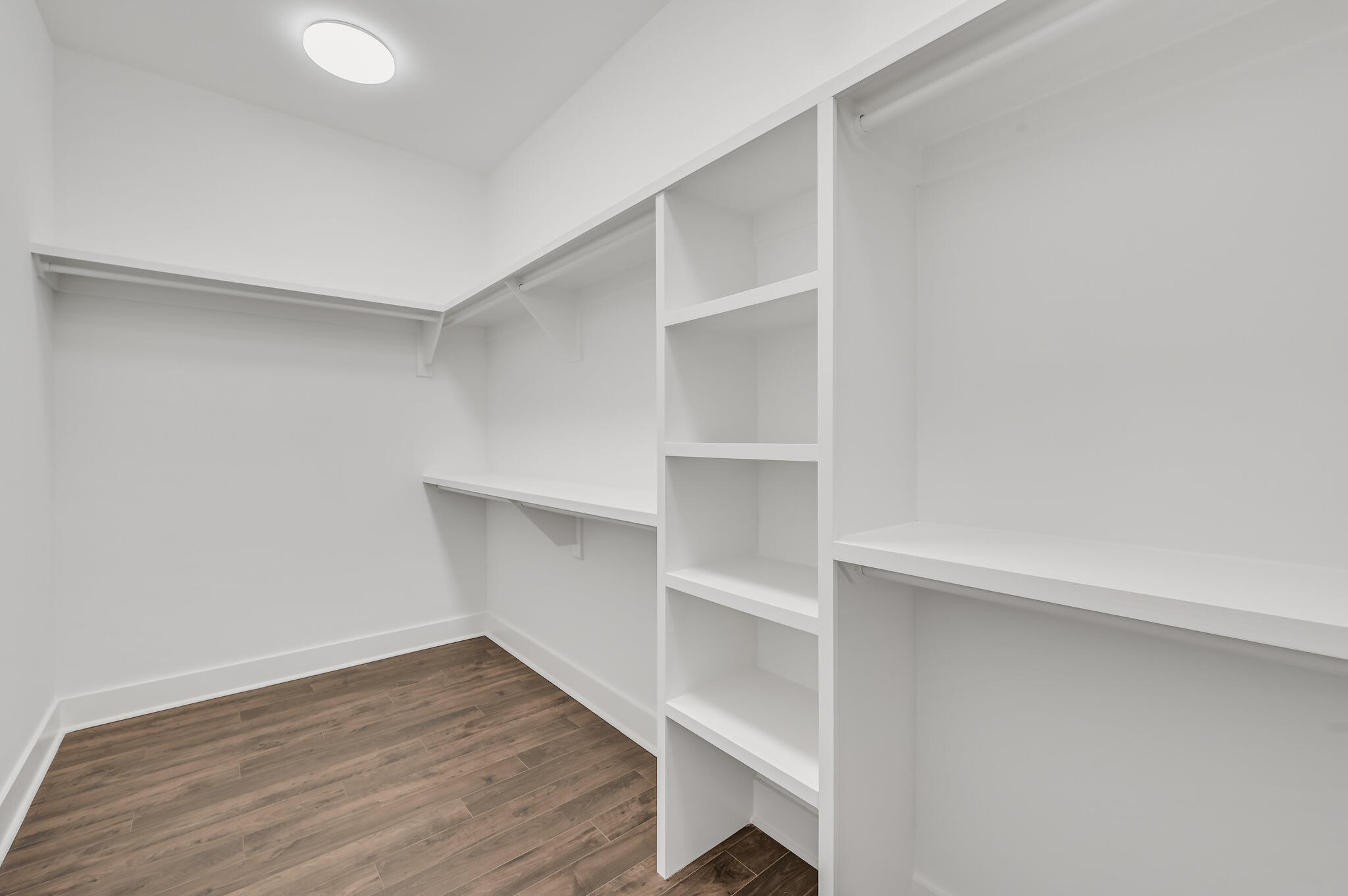 95 Ravine Rd Inlet Beach Inlet Beach, FL 32461 - Photo 30 of 42 a view of walk in closet with empty racks