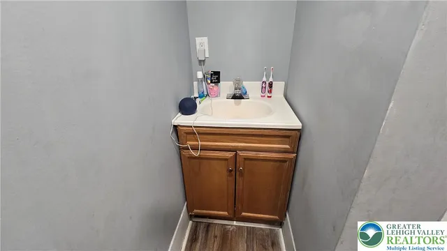 a view of backyard with large trees