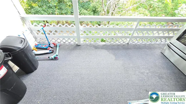 a view of entry way with wooden floor