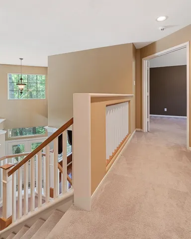 a view of an entryway with stairs
