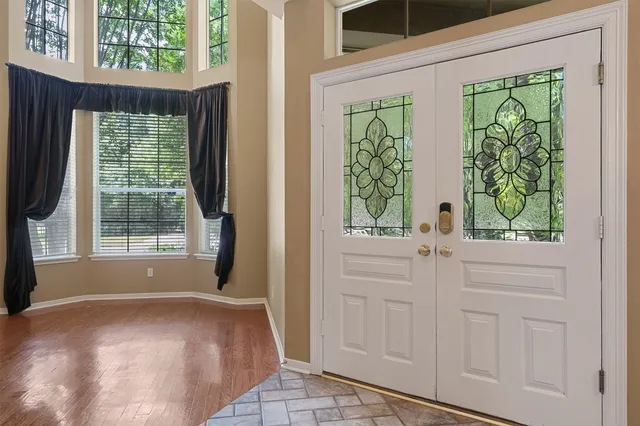 a view of a room that has a window in it