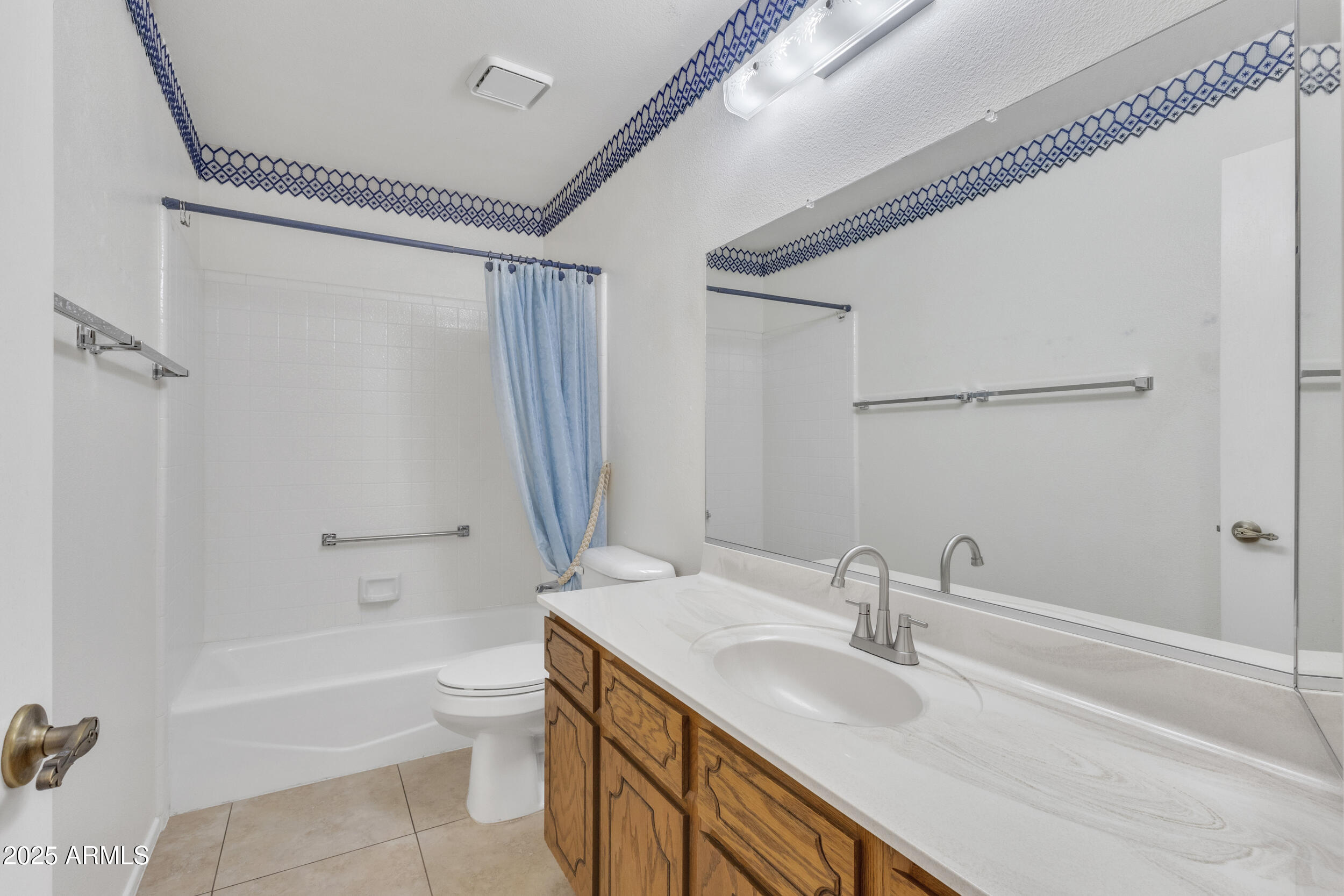 520 South Greenfield Road, Unit 13 Mesa, AZ 85206 - Photo 18 of 44 a bathroom with a granite countertop sink toilet and shower