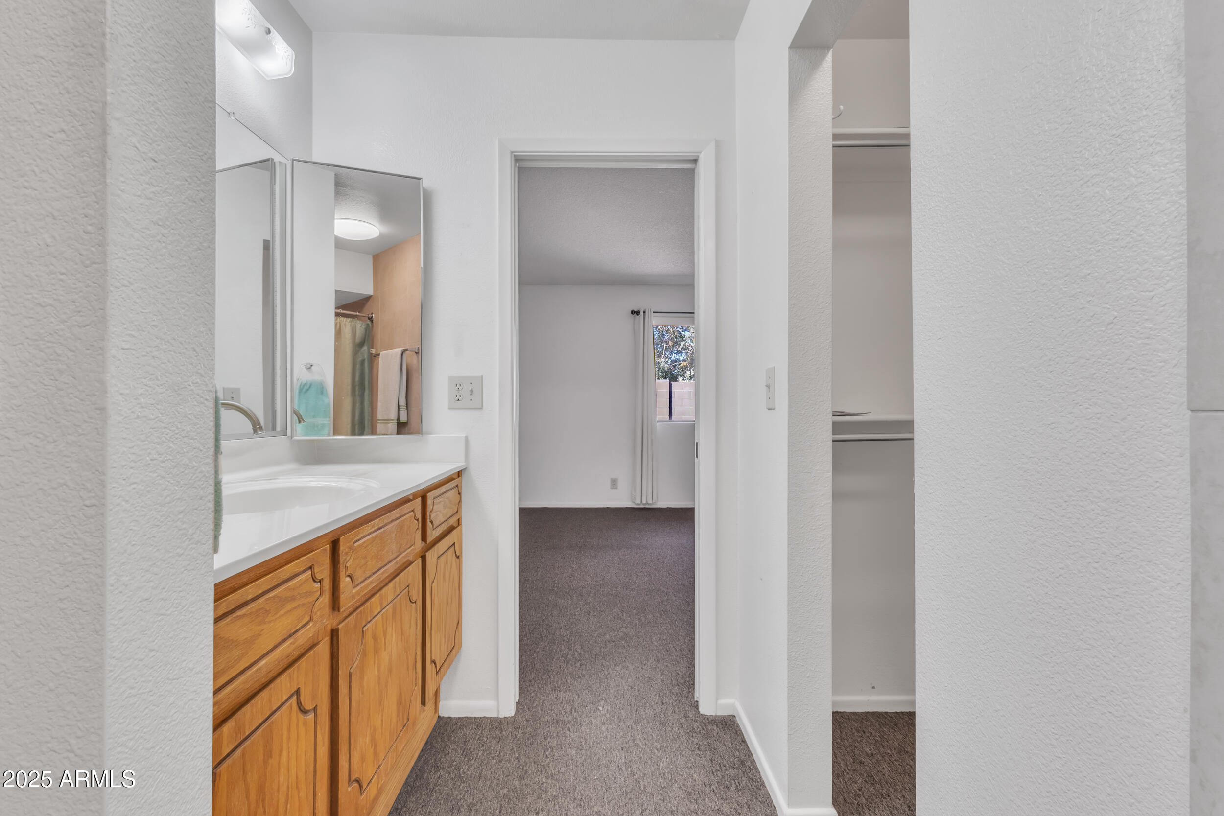 520 South Greenfield Road, Unit 13 Mesa, AZ 85206 - Photo 28 of 44 a view of a kitchen from the hallway