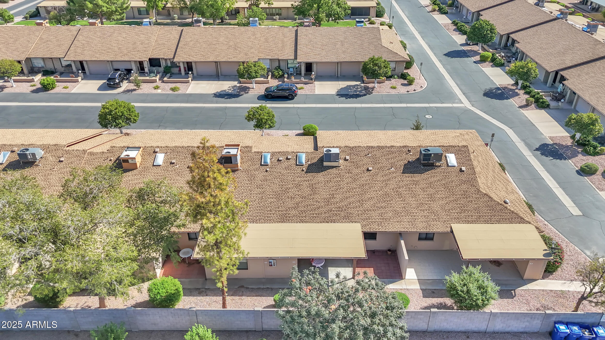 520 South Greenfield Road, Unit 13 Mesa, AZ 85206 - Photo 35 of 44 an aerial view of a house with garden space and street view