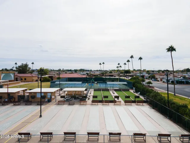 an aerial view of a house with outdoor space