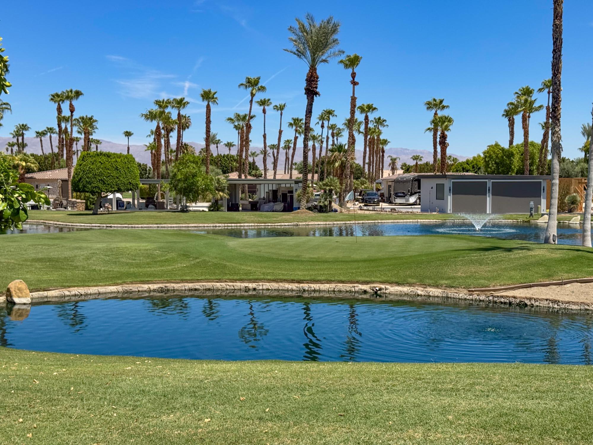 80394 Ave 48, Unit 423 Indio, CA 92201 - Photo 12 of 18 a view of a golf course with a house
