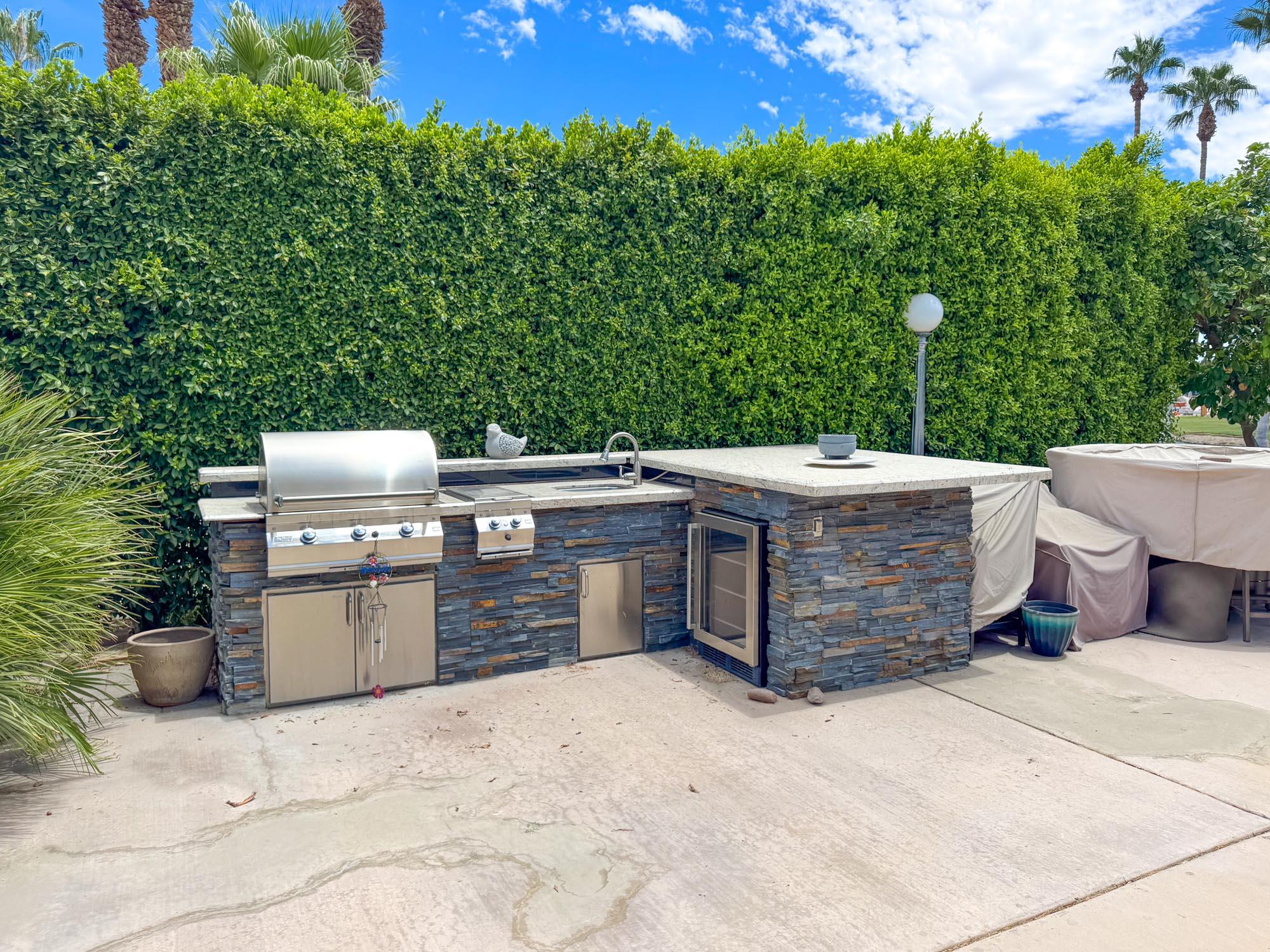 80394 Ave 48, Unit 423 Indio, CA 92201 - Photo 4 of 18 a view of a kitchen with a fireplace