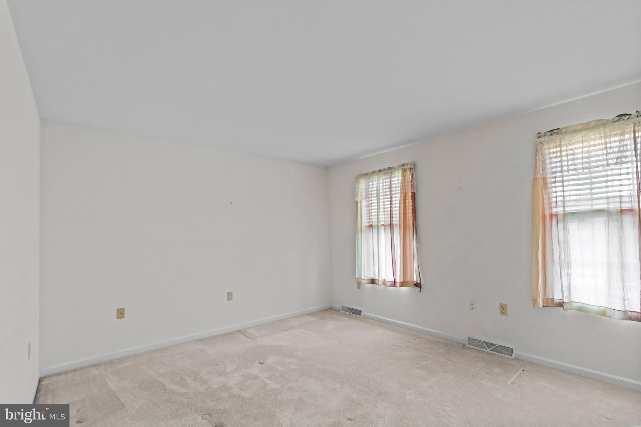 1004 Hostetter Road Hanover, PA 17331 - Photo 7 of 15 an empty room with windows