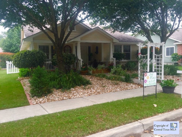 4605 Mather Kyle, TX 78640 - Photo 1 of 1 a front view of a house with a yard