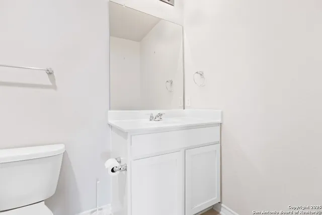 a bathroom with a bathtub and a toilet