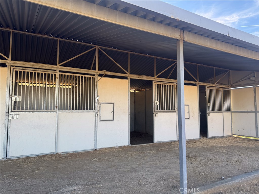 44665 95th Street East Lancaster, CA 93535 - Photo 21 of 34 a view of an empty room with wooden floor