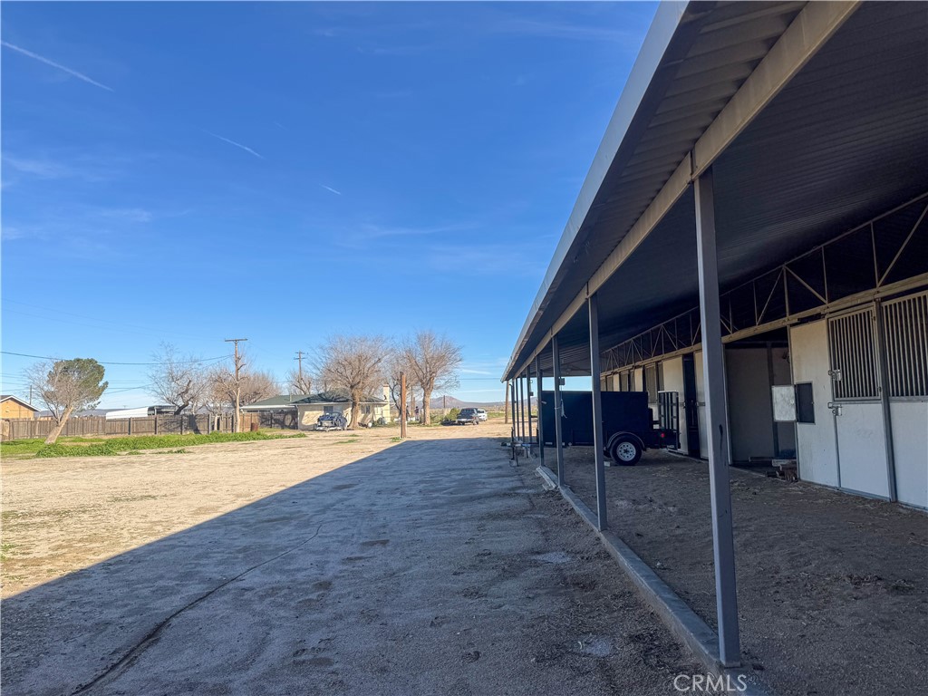 44665 95th Street East Lancaster, CA 93535 - Photo 23 of 34 a view of a swimming pool with an outdoor seating