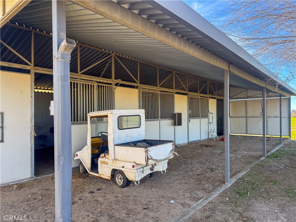 44665 95th Street East Lancaster, CA 93535 - Photo 24 of 34 a view of a two chairs in the room