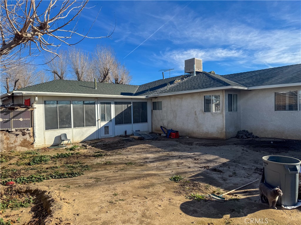 44665 95th Street East Lancaster, CA 93535 - Photo 29 of 34 a view of a house with backyard and sitting area