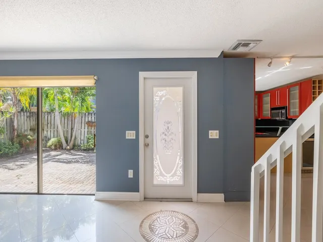 a view of an entryway with a fan