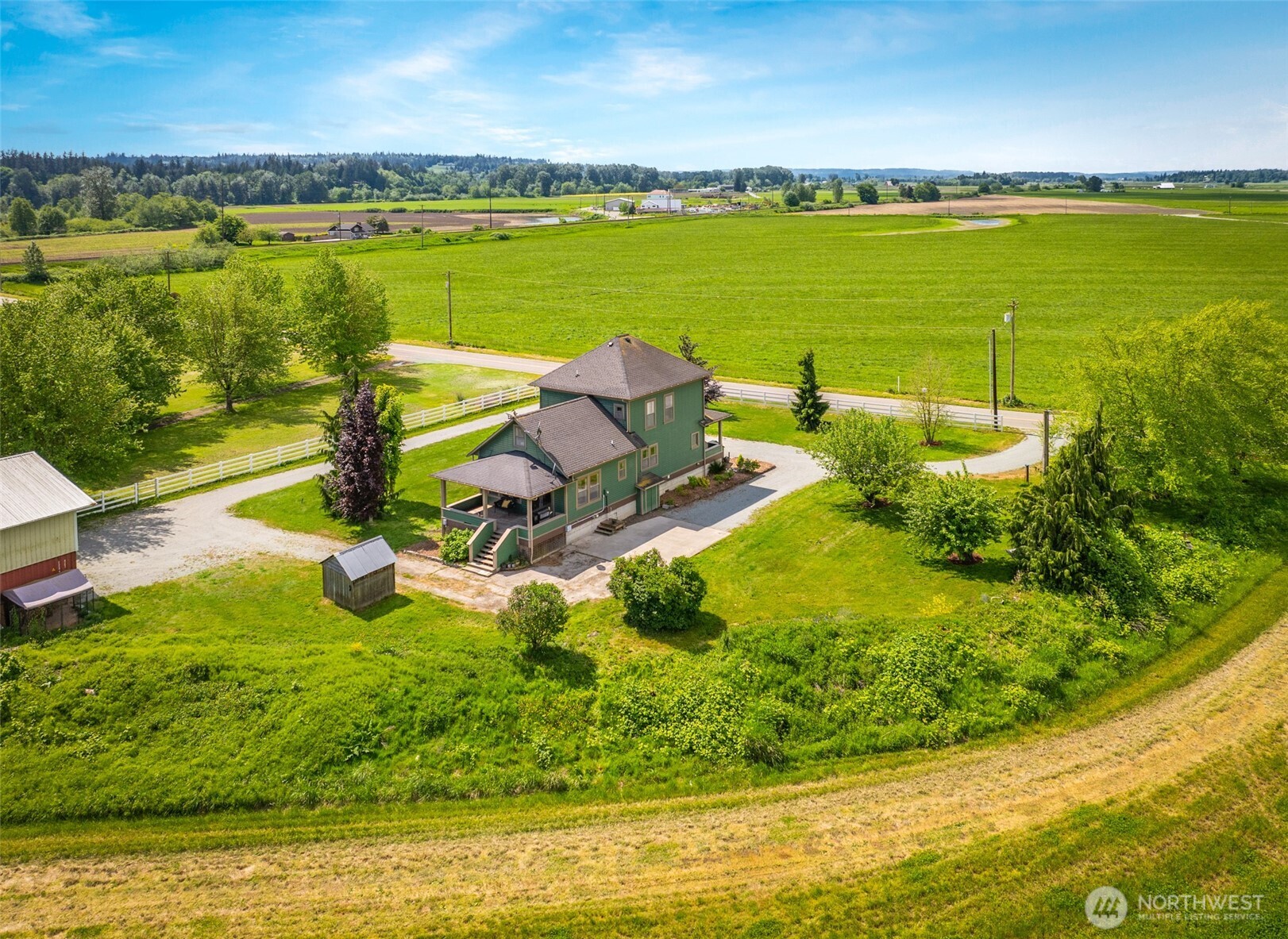2304 Norman Road Stanwood, WA 98292 - Photo 26 of 39 a view of a lake with a big yard