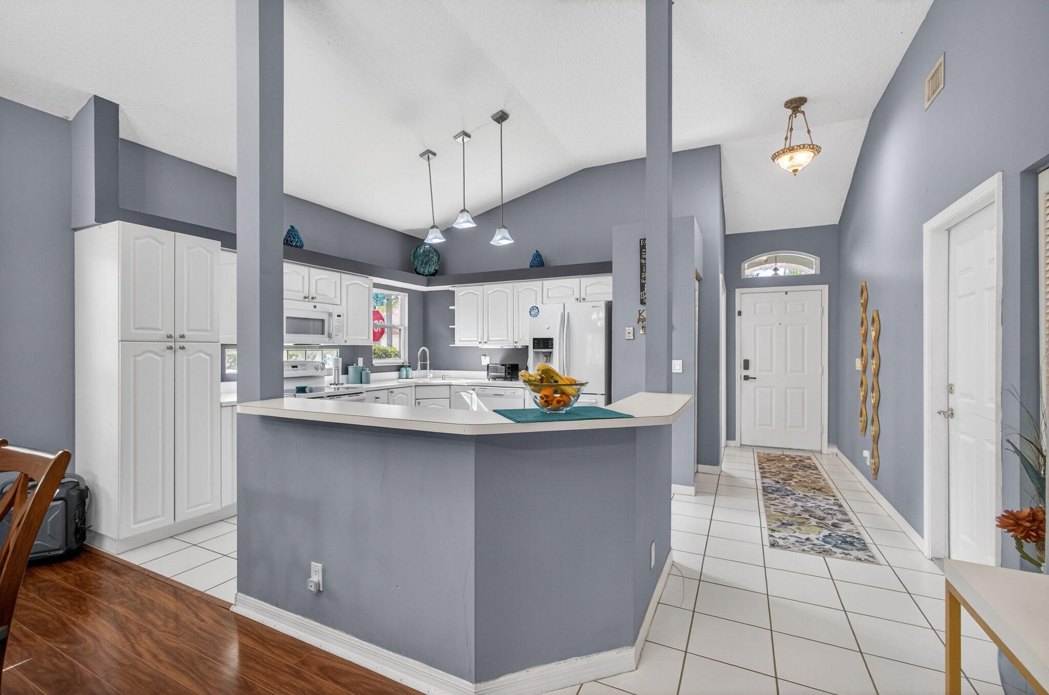 5156 Elpine Way Riviera Beach, FL 33418 - Photo 11 of 97 a kitchen with stainless steel appliances a sink stove and refrigerator
