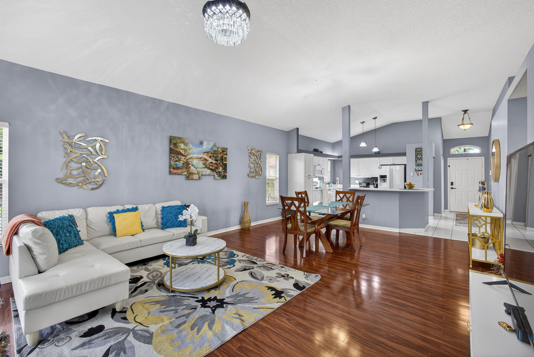 5156 Elpine Way Riviera Beach, FL 33418 - Photo 27 of 97 a living room with furniture and kitchen view