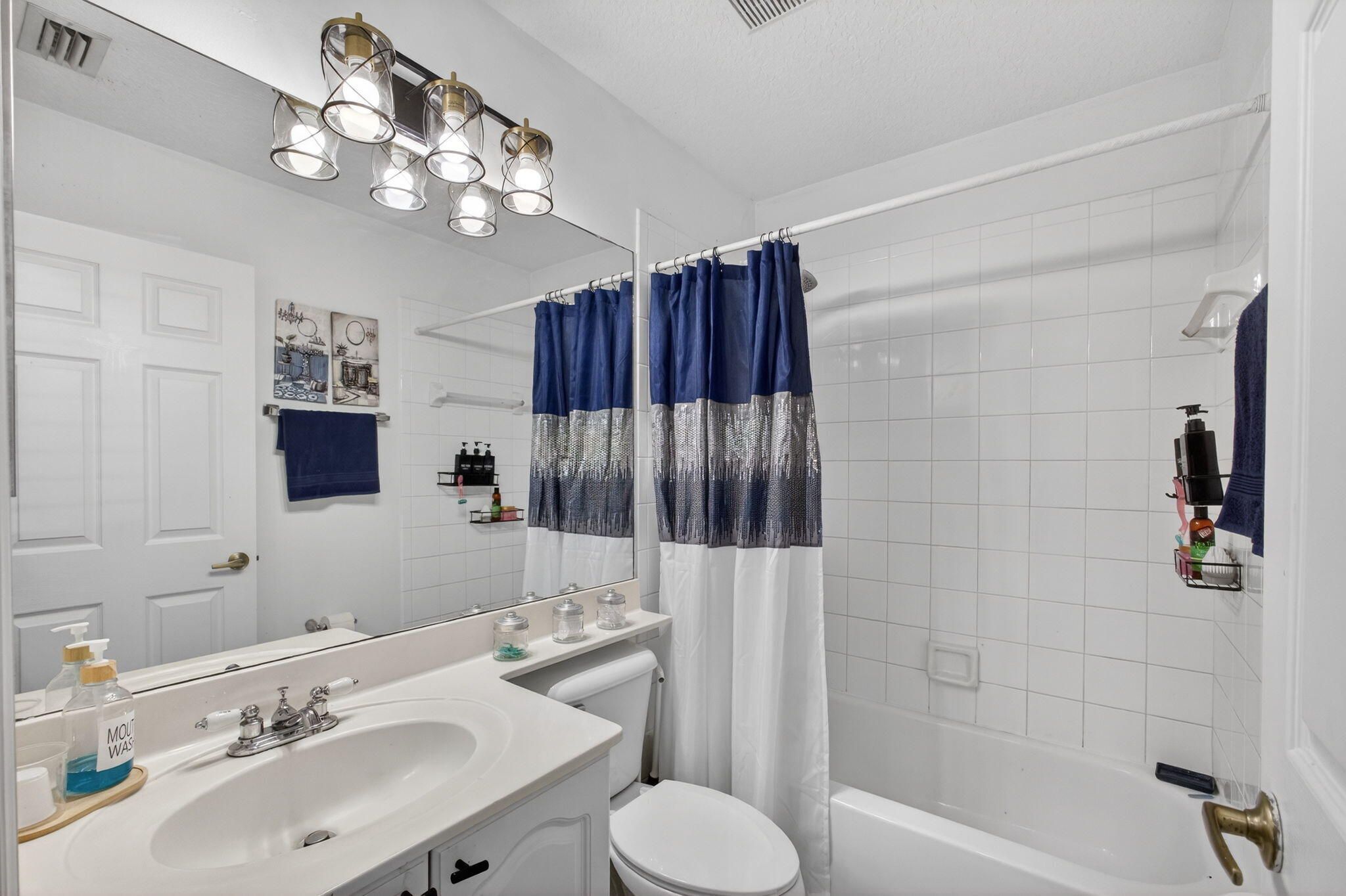 5156 Elpine Way Riviera Beach, FL 33418 - Photo 42 of 97 a bathroom with a sink toilet and shower