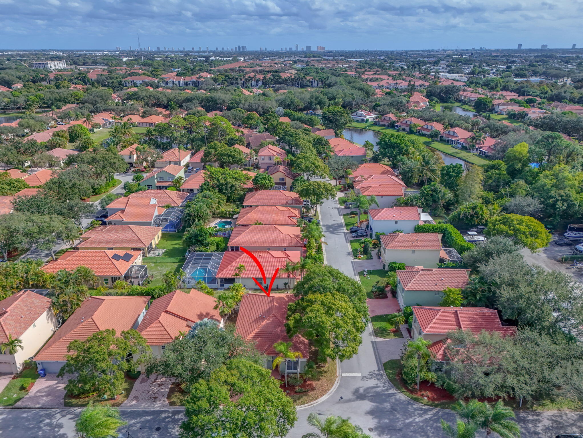 5156 Elpine Way Riviera Beach, FL 33418 - Photo 64 of 97 an aerial view of residential house with outdoor space and lake view