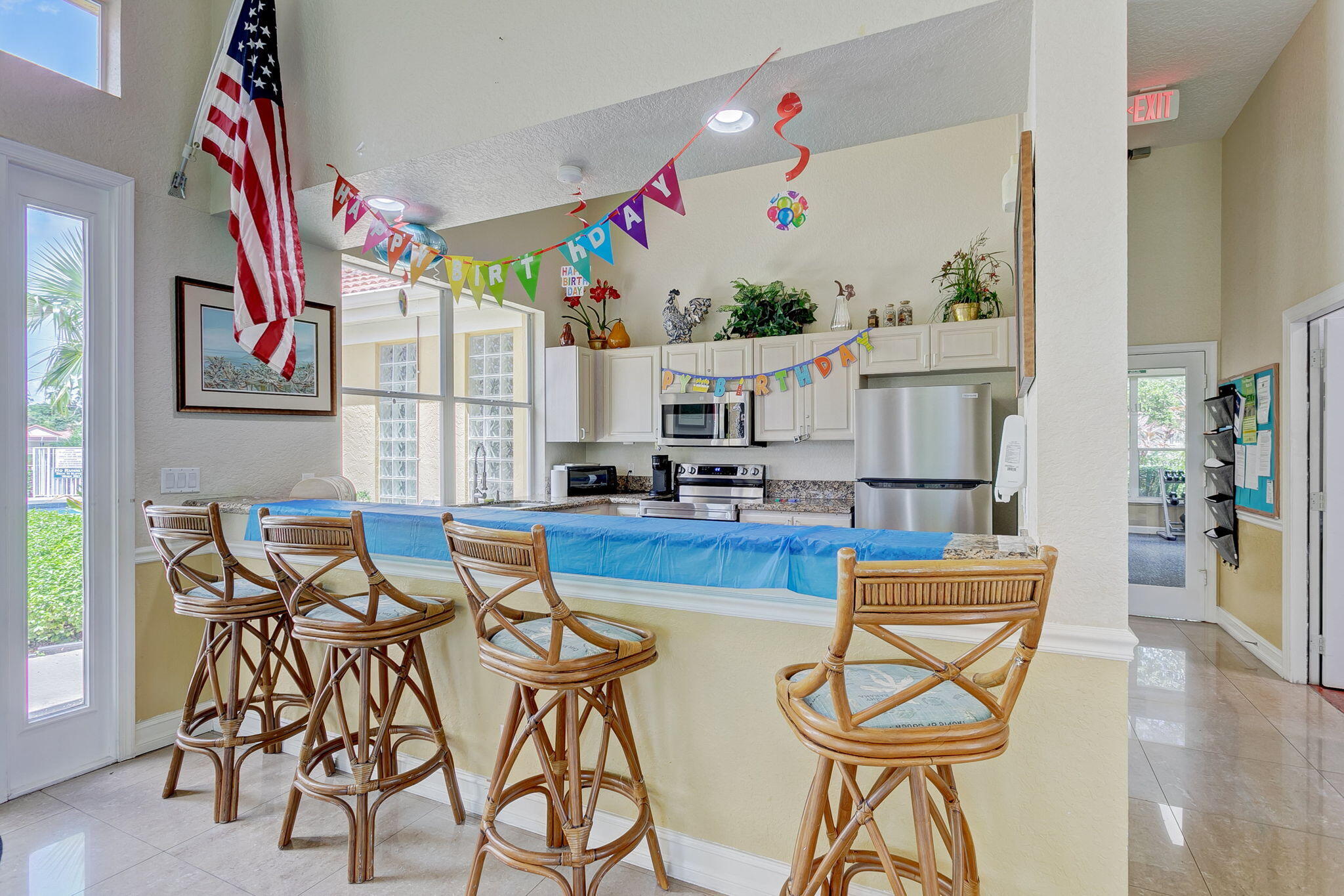 5156 Elpine Way Riviera Beach, FL 33418 - Photo 85 of 97 a view of a dining room with furniture and a kitchen