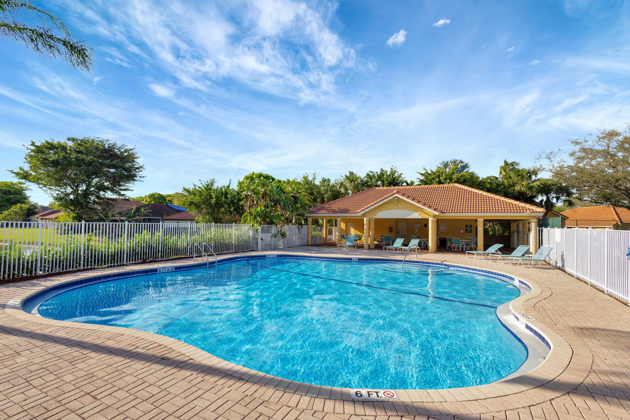 5156 Elpine Way Riviera Beach, FL 33418 - Photo 86 of 97 a view of a house with swimming pool and a yard
