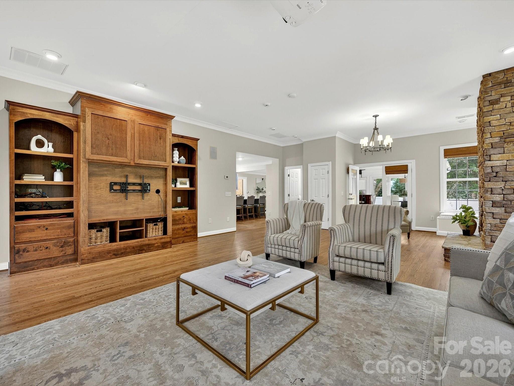 6344 Dovefield Road Charlotte, NC 28277 - Photo 19 of 46 a living room with furniture a rug and kitchen view