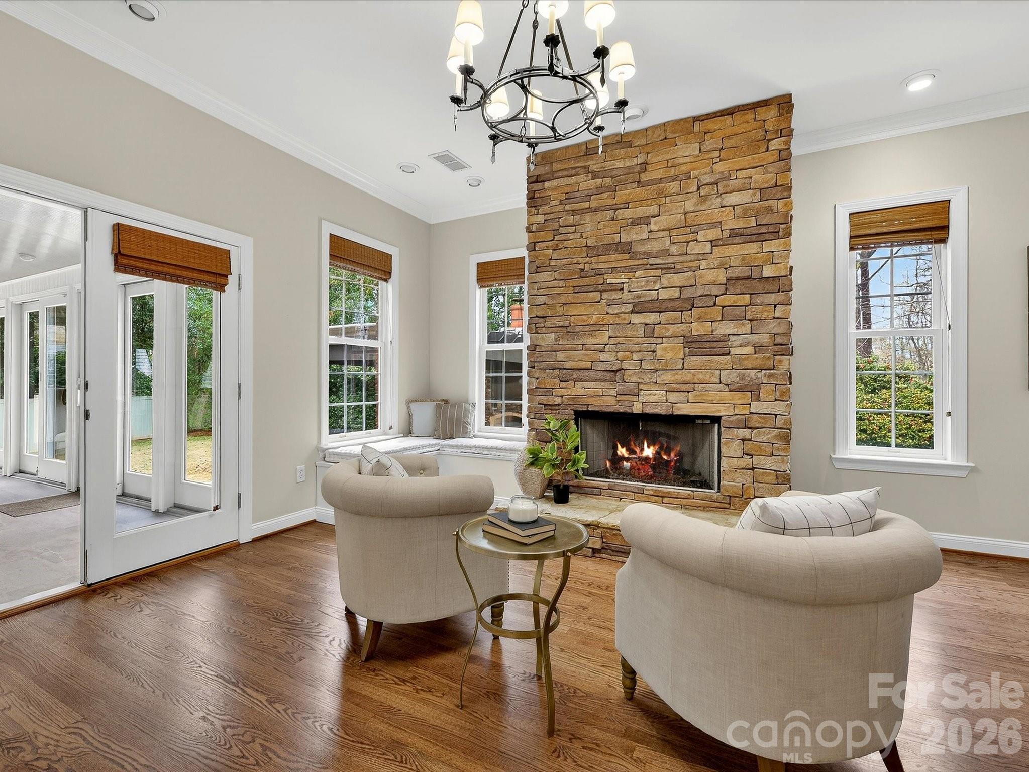 6344 Dovefield Road Charlotte, NC 28277 - Photo 20 of 46 a living room with furniture and a fireplace