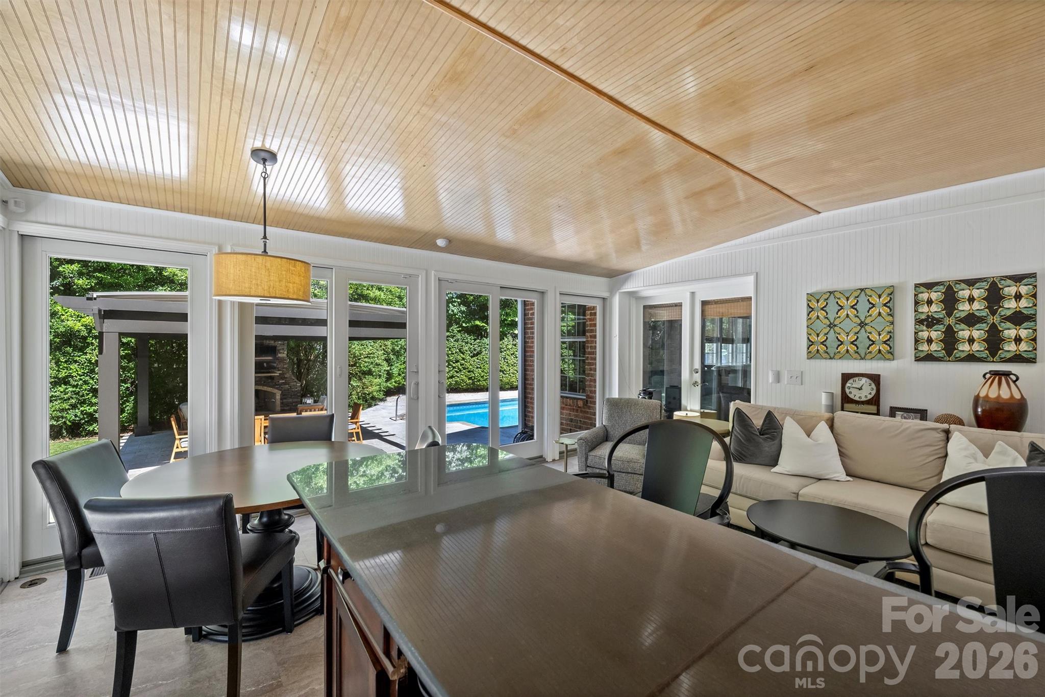 6344 Dovefield Road Charlotte, NC 28277 - Photo 22 of 46 a living room with furniture and large windows