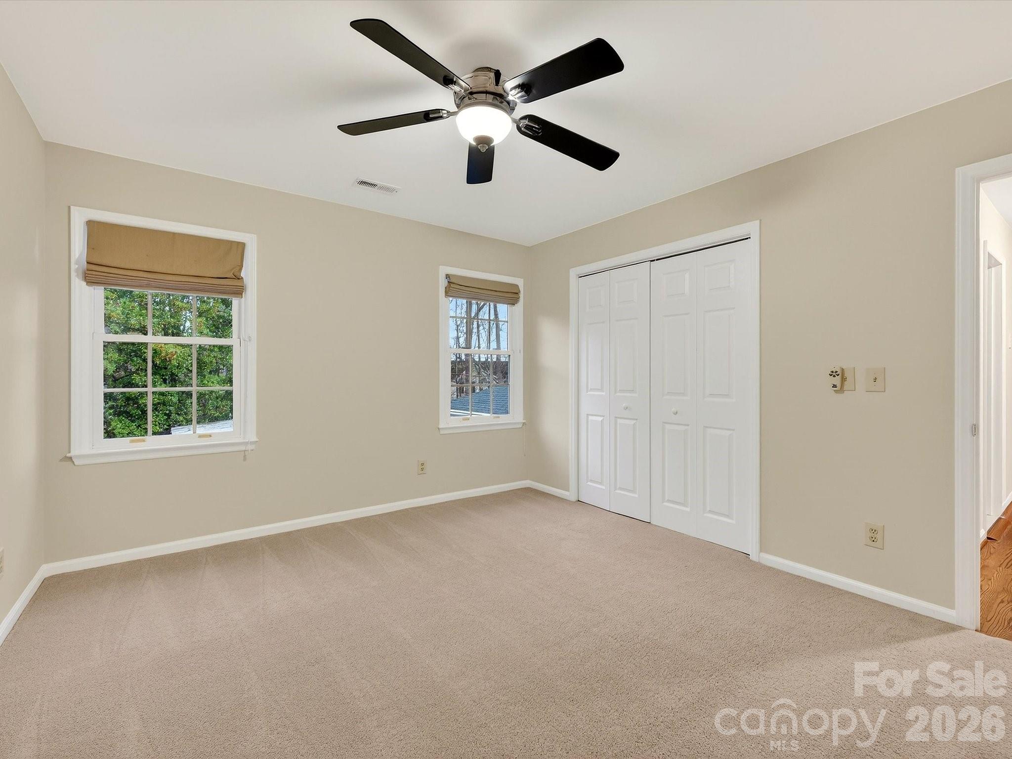 6344 Dovefield Road Charlotte, NC 28277 - Photo 31 of 46 a view of an empty room with a window