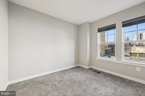 a view of storage and utility room with washer and dryer