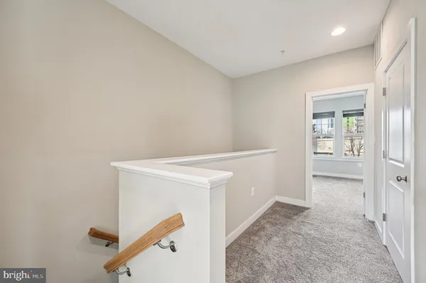 a bathroom with a shower and a sink