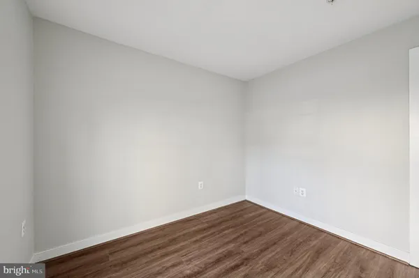 a living room with furniture a window and a table