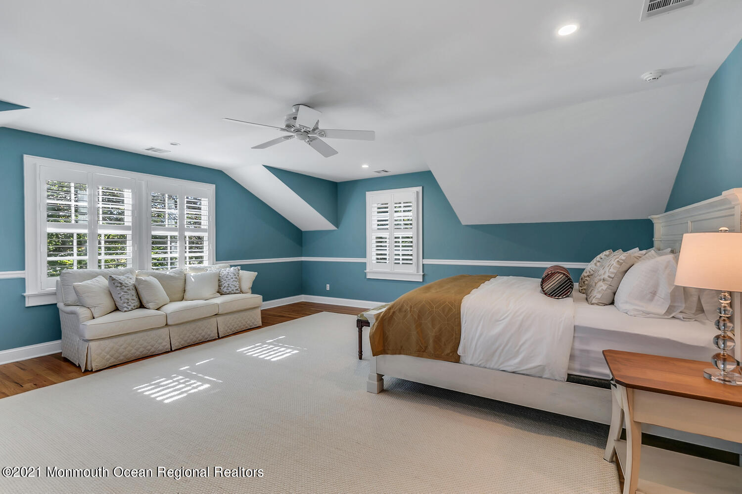 299 Cooper Road Middletown, NJ 07701 - Photo 20 of 27 a bedroom with a bed couch and window