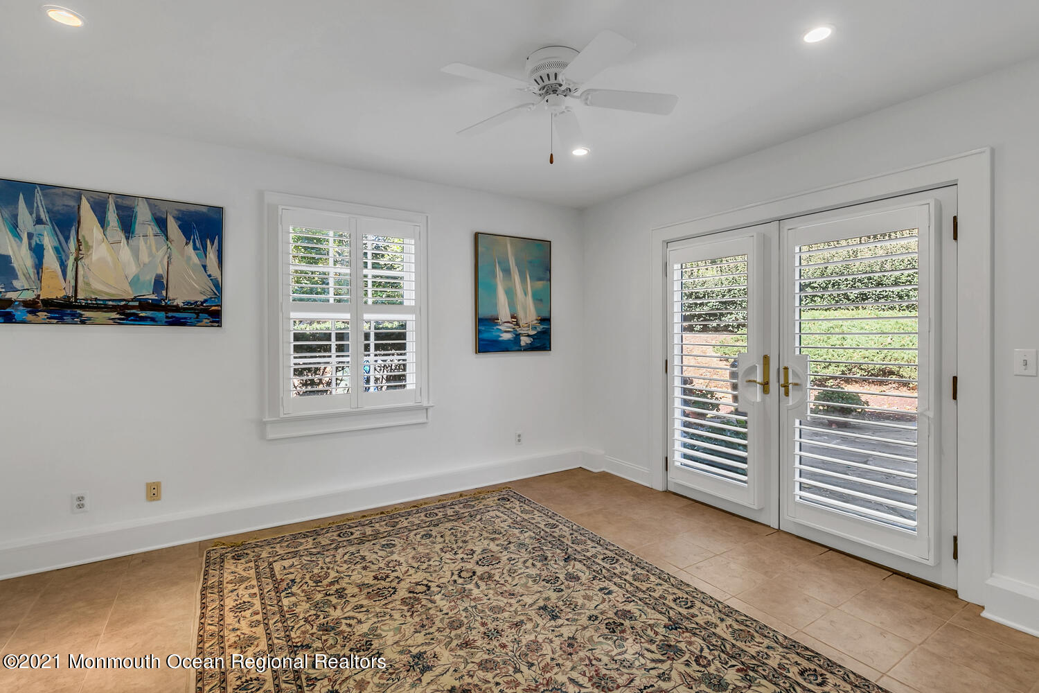 299 Cooper Road Middletown, NJ 07701 - Photo 21 of 27 a view of wooden floor and windows in a room